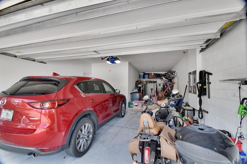 Three car tandem garage with mounted shop vac system