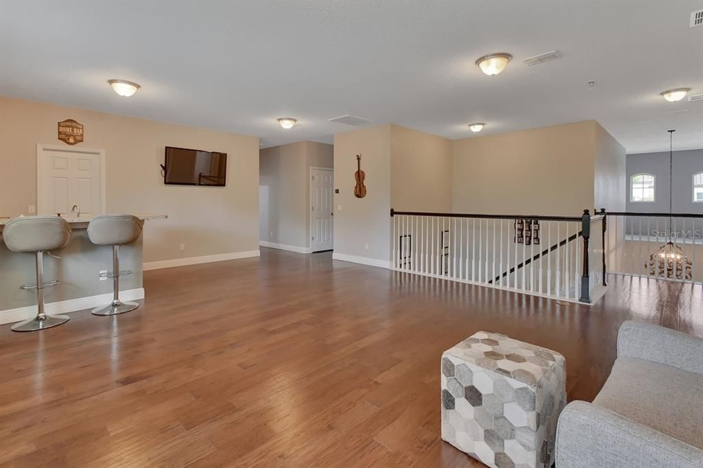 Upper Floor Loft / Game Room with Wet Bar