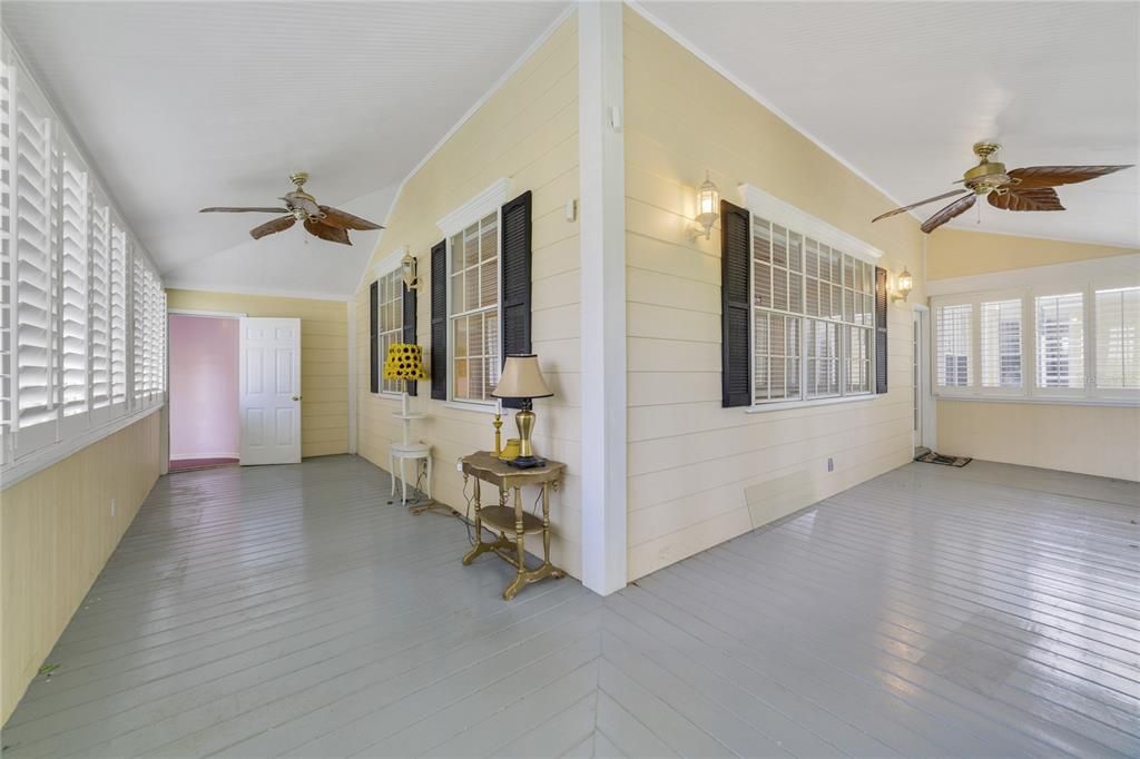 Beautiful 2nd floor porch in between apartment and main house, with great views of East Lake Tohopekaliga