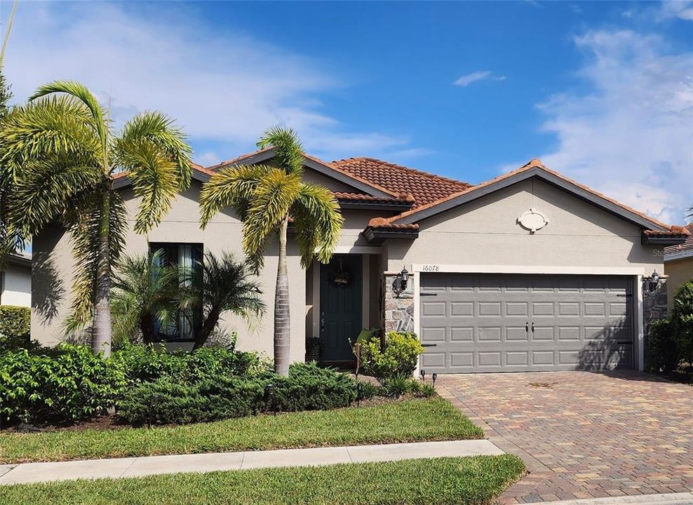 Front of House w/ 2 car garage.