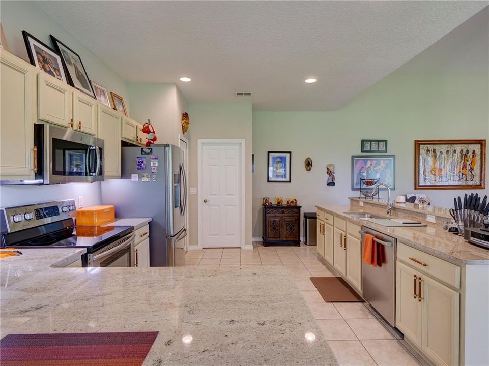 Granite Countertops, Under Cabinet Lighting, Custom Cabinets and Pulls