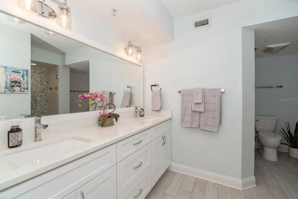 Primary bath will not disappoint! Dual sinks with quartz countertop.