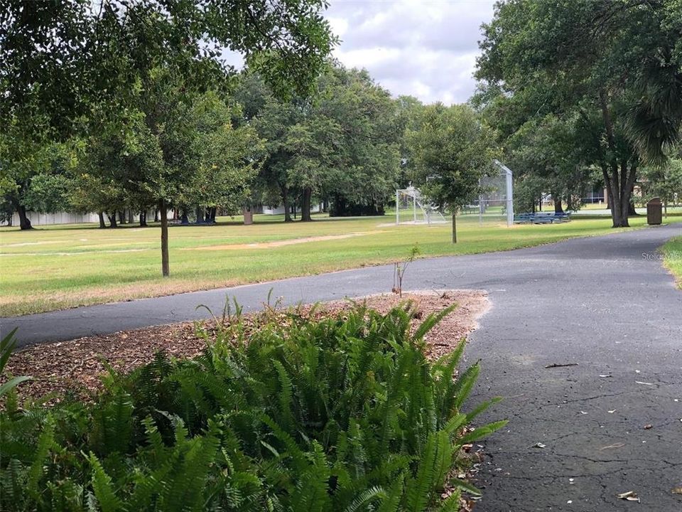 2-mile walking path goes around the lake and through the park