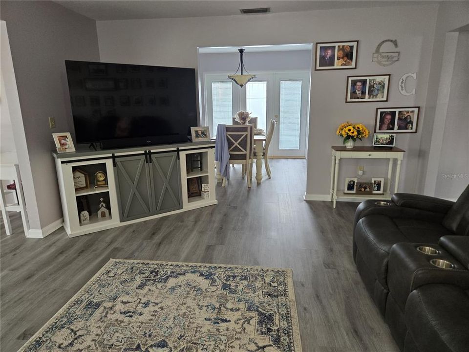 living room with vinyl flooring