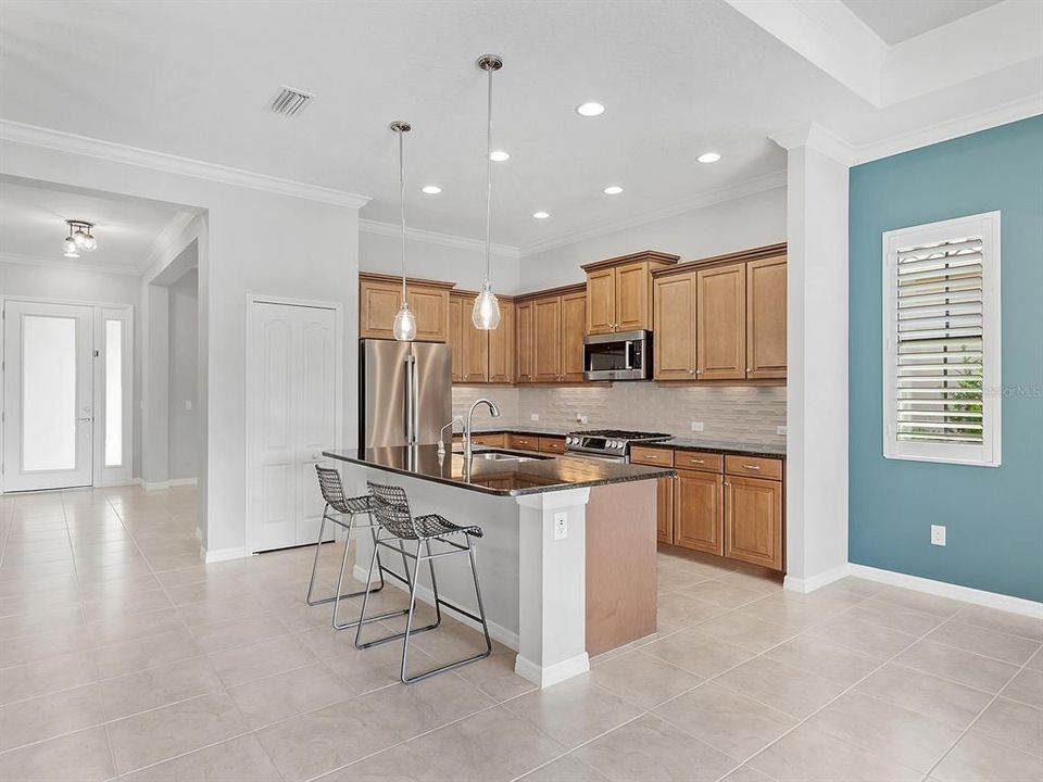 Kitchen with close proximity to the entrance door