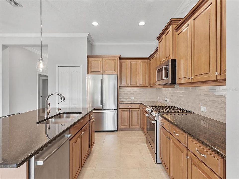 Wood cabinetry with pull-out drawers