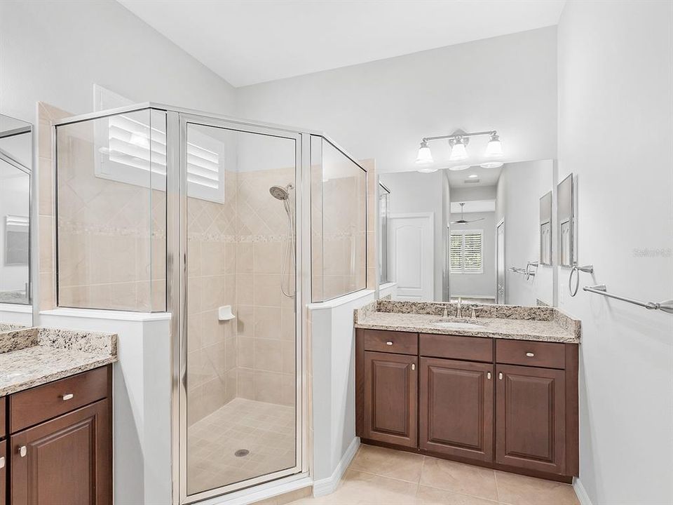 Primary bathroom with split vanities