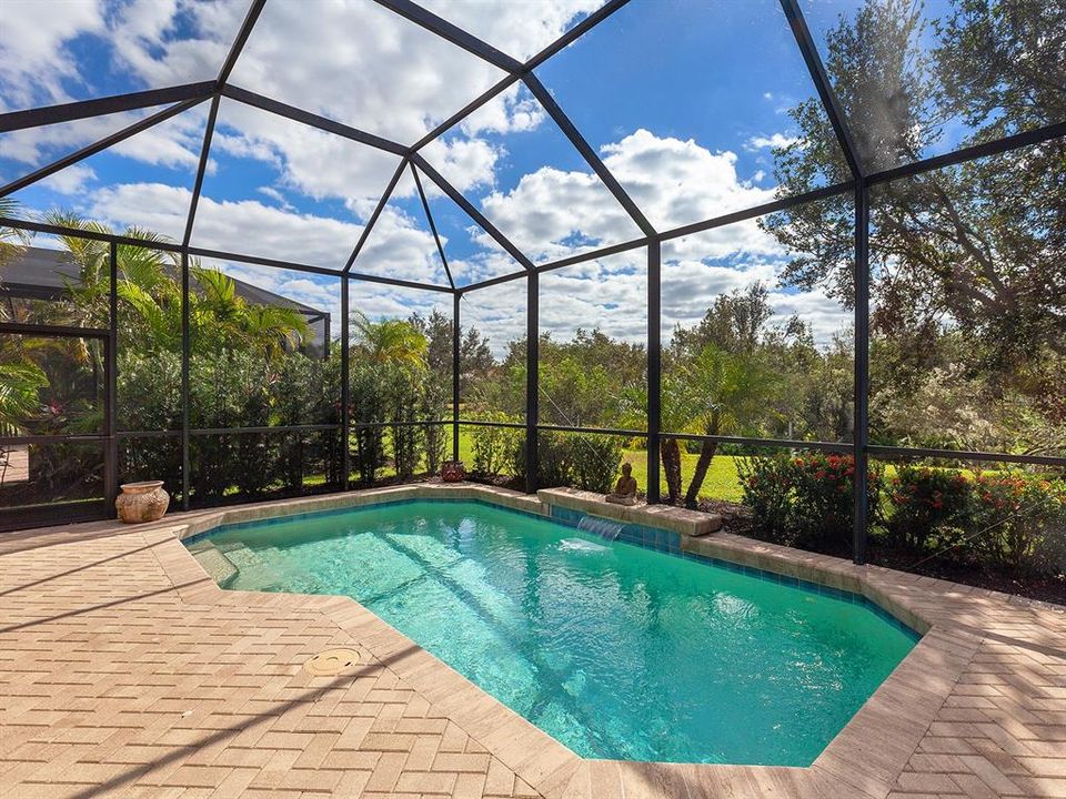 Screened lanai with saltwater heated pool