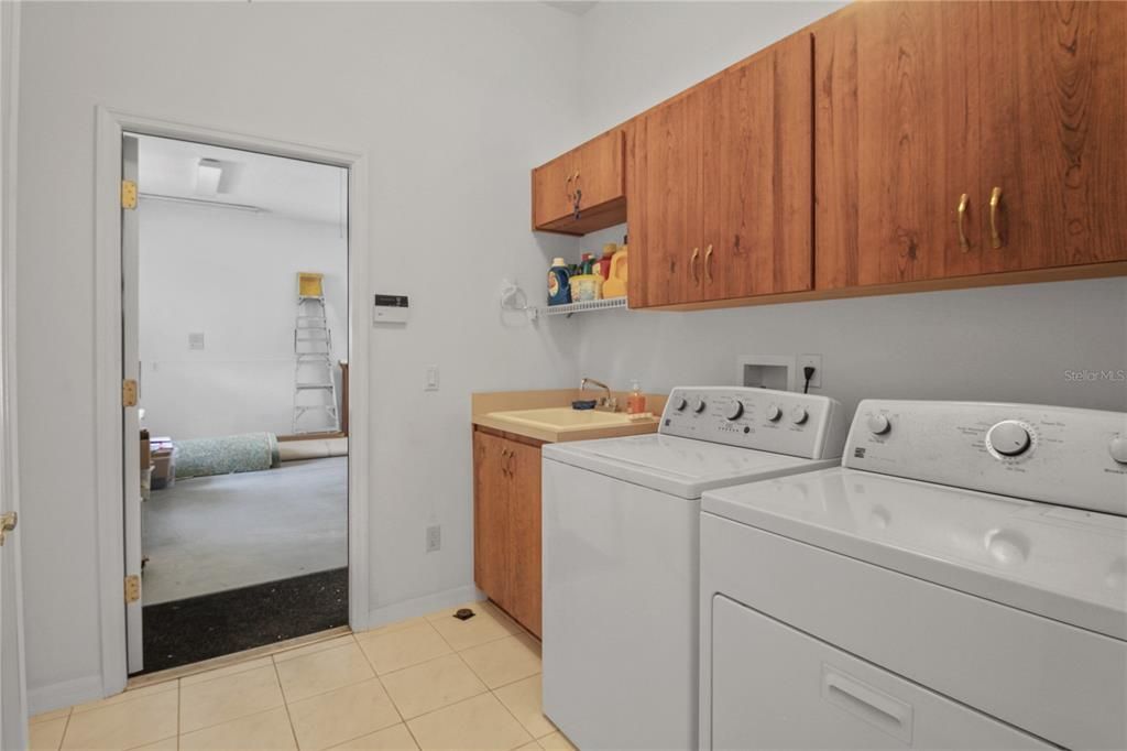 Laundry Room is between the garage and the kitchen