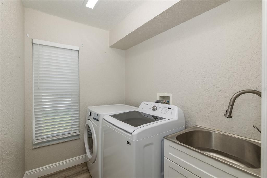 Separate Laundry Room with Utility Sink