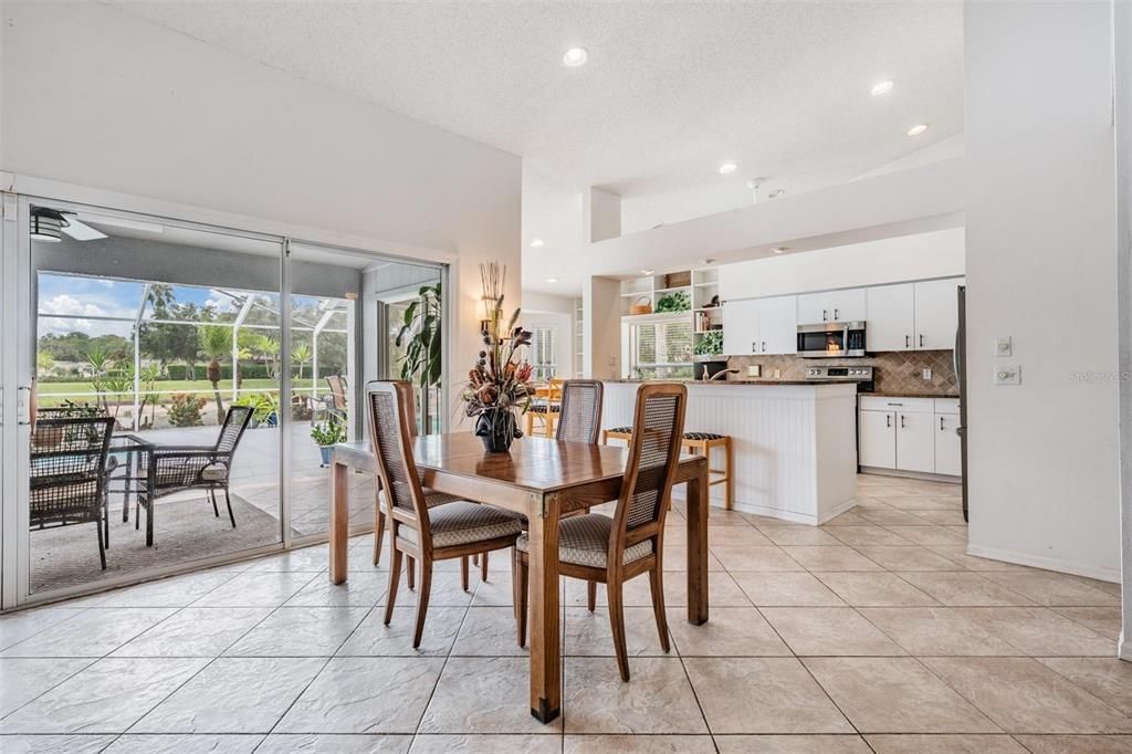 Dining area with lanai views adjoin kitchen