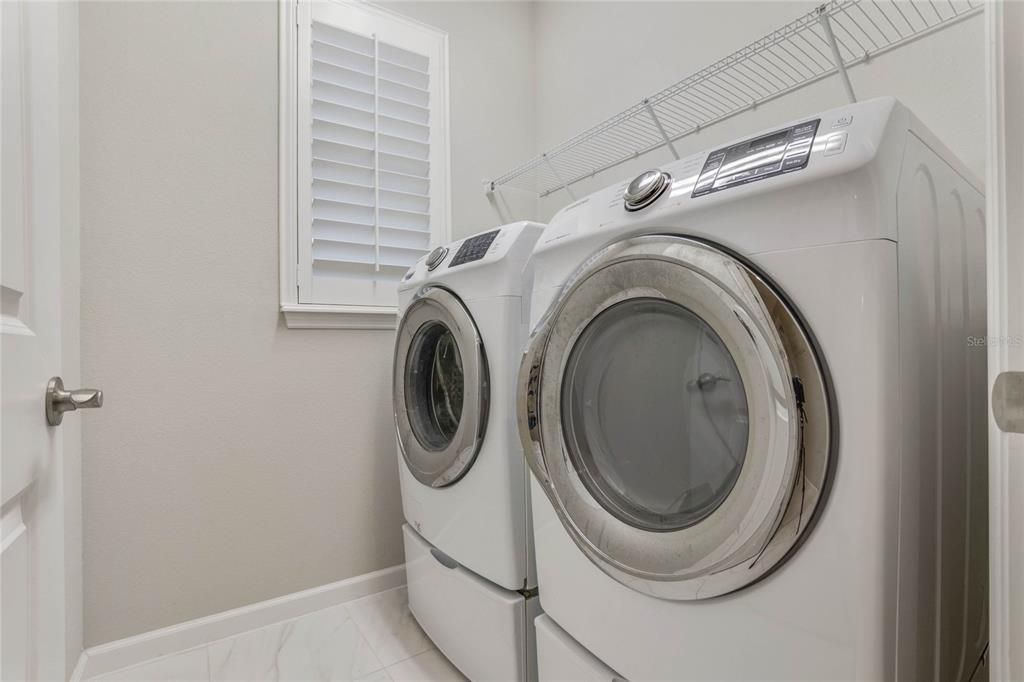 6' x 6' Utility Room w/ electric Dryer & an additional natural gas connection for future use