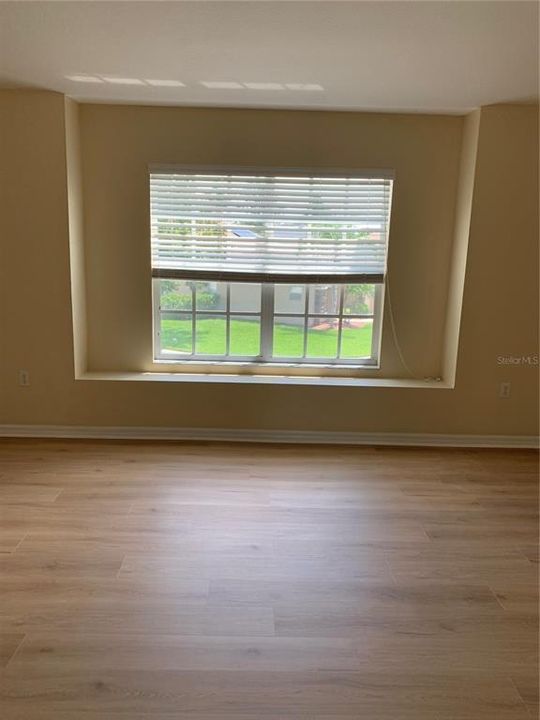 Very large bedroom with front window