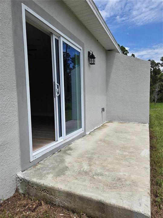 Lanai with concrete slab and center wall