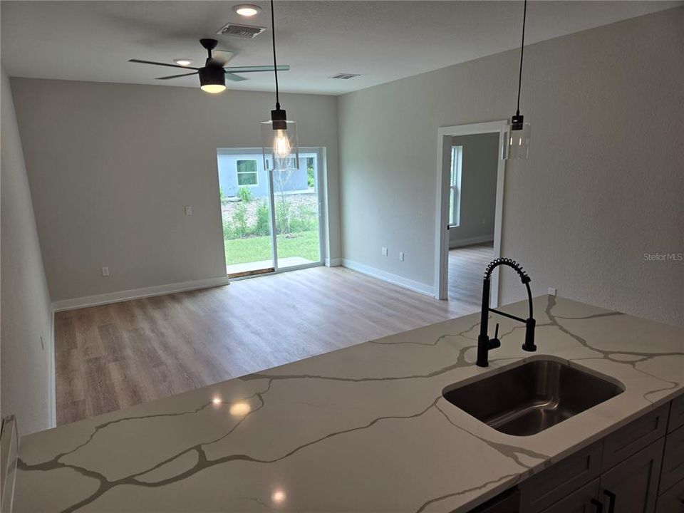 view from kitchen overlooking living room