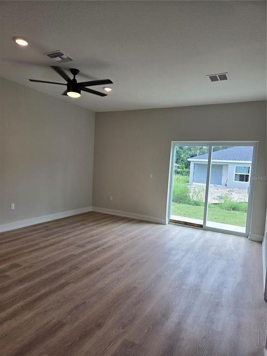 Open Living Room with sliding door