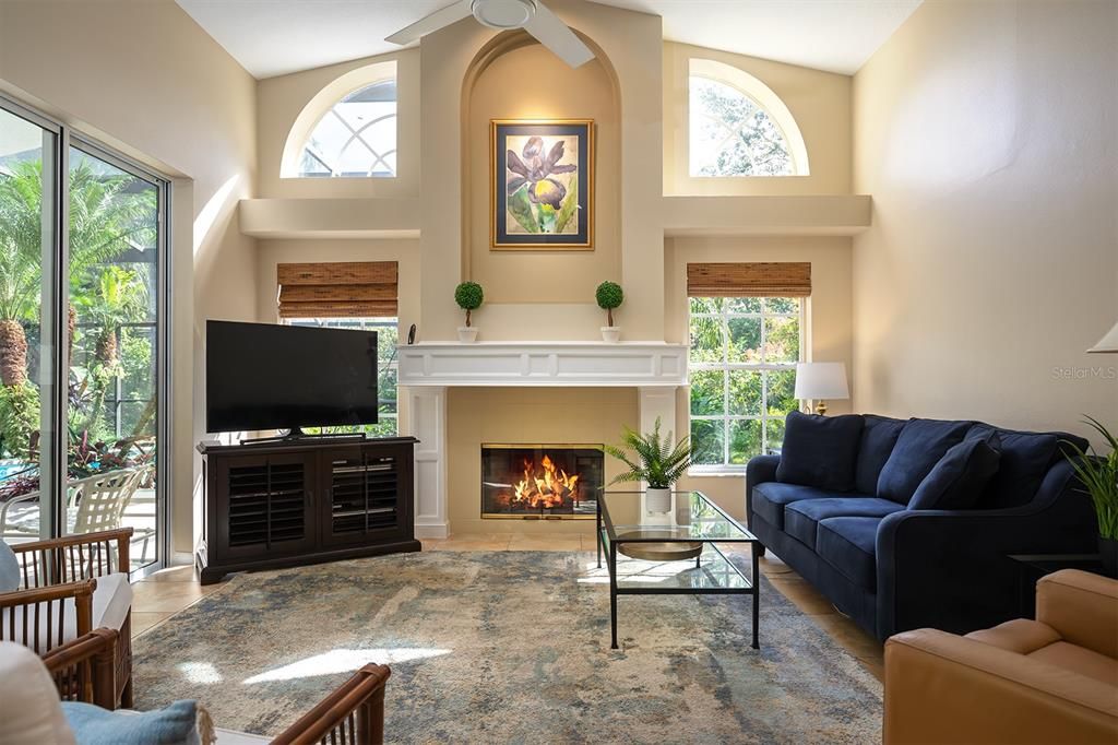 Cozy fireplace anchors the family room.