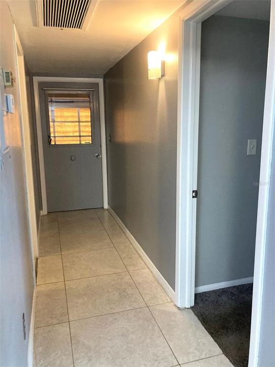 Hallway leading from kitchen and living room.