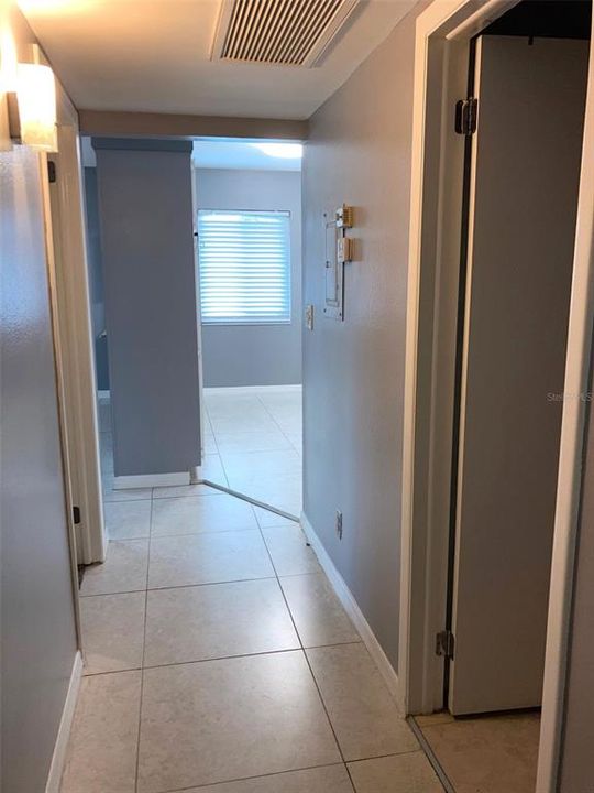 Hallway, facing toward living room and kitchen area.