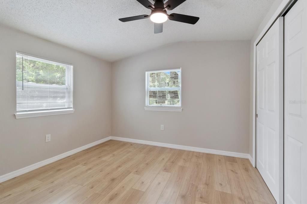 Master Bedroom w/ Bypass Closet Doors