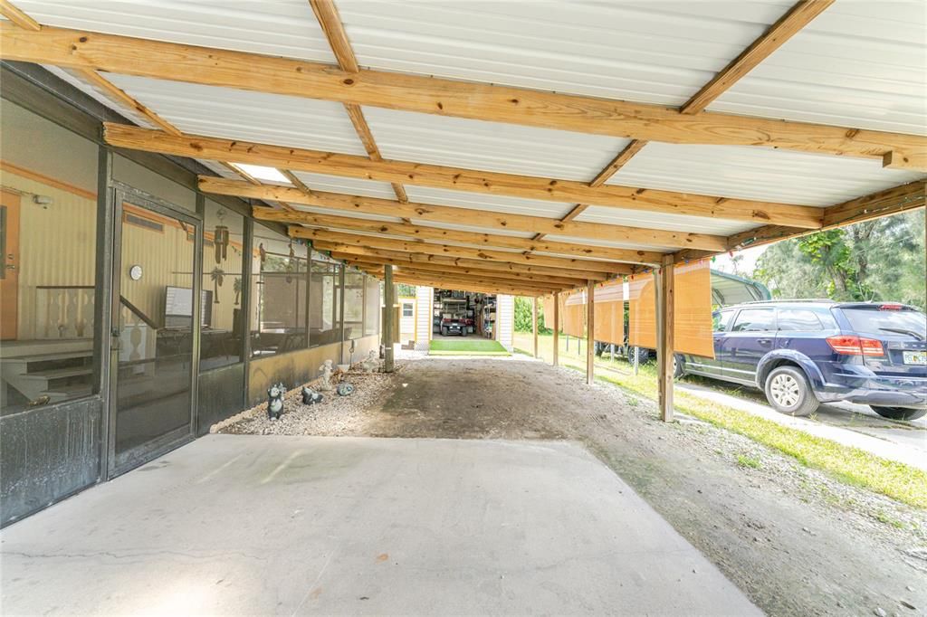 Carport- large enough for 3 cars under roof!