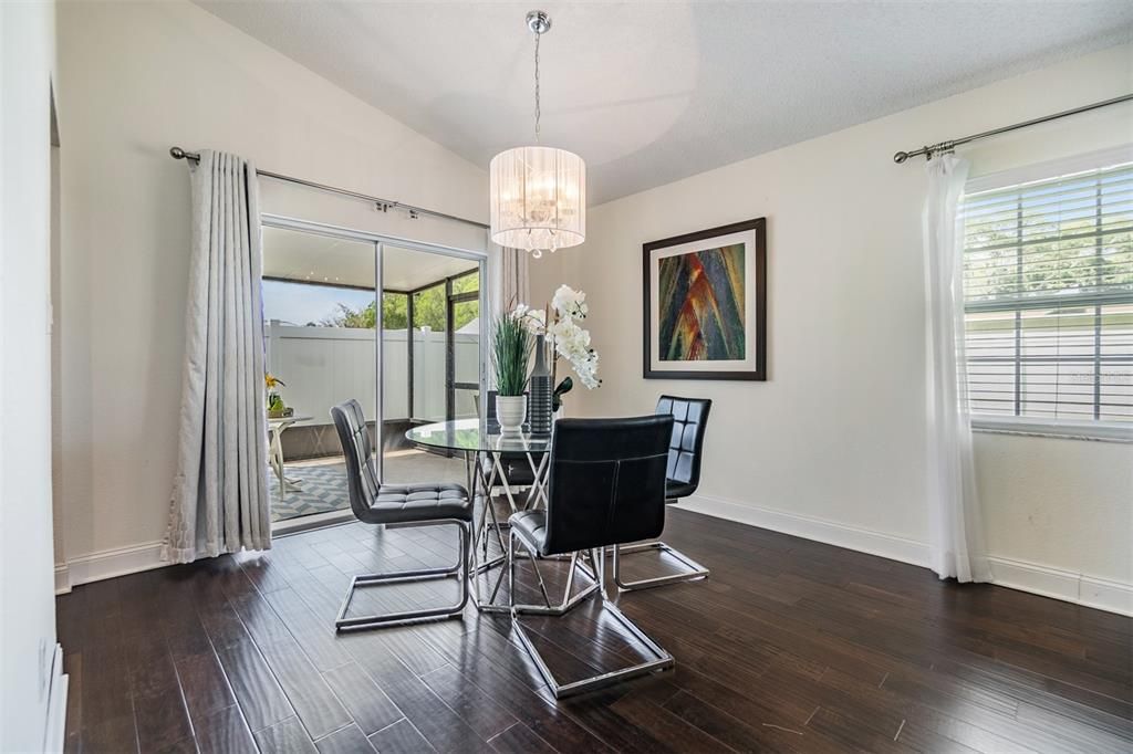 dining room with slider to screened porch