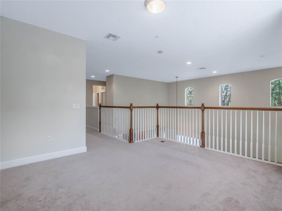 Loft area # 2 also includes a walk in closet with built in shelving great for storage