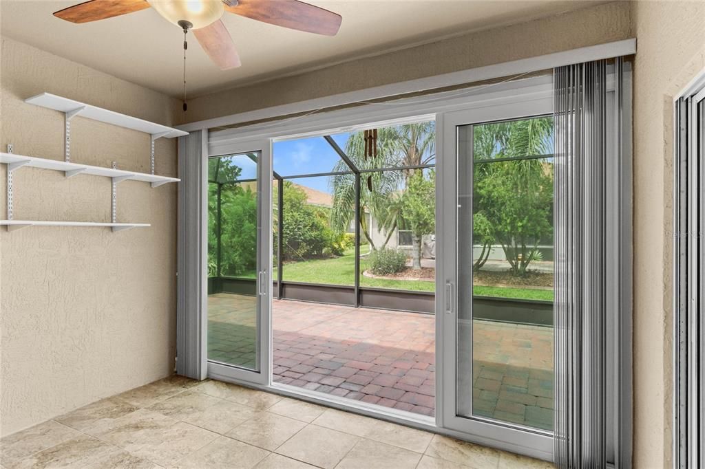 Florida Room features Upgraded Hurricane Impact Sliding Door