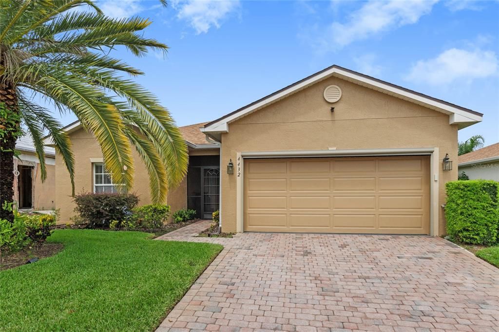 2 Car Garage with Garage Door Opener & Paved Driveway and Walkway