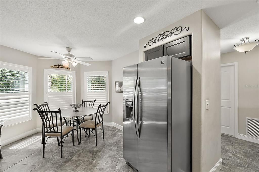 Nook Area perfect for morning coffee looking out across the street to lush Tree & BIrm area