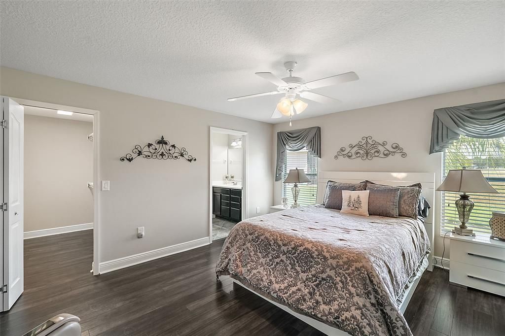 Master Bedroom has Laminate Flooring  it flows into the large walk in closet.&