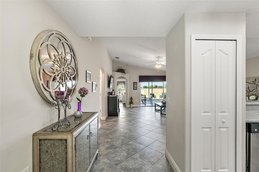 Foyer Entrance, upgrades ceramic tile is in the Kitchen , Foyer , Great Room , Hall . and both bathrooms.