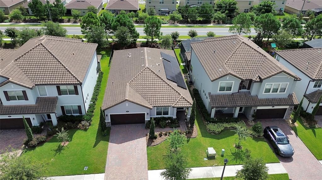 Paved Driveway and Tile roof.