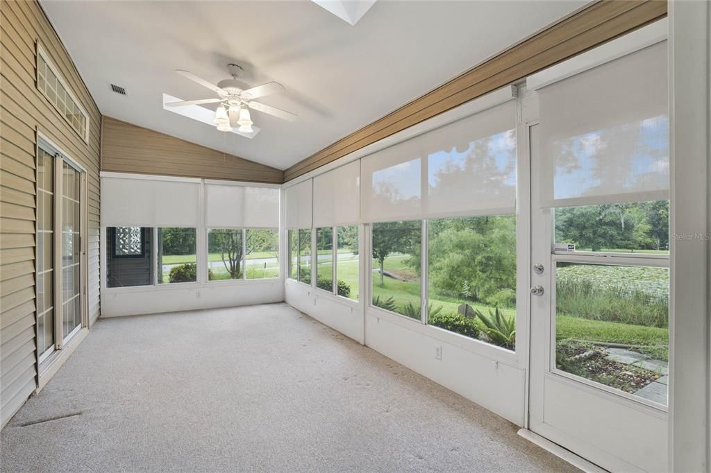 Four season Sunroom with skylights, new glass windows and remote control blinds