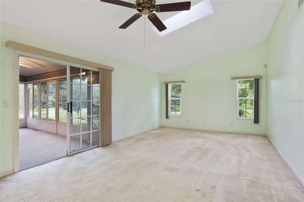 Family Room, off the kitchen. Over-looks water and conservation with access to the Sunroom