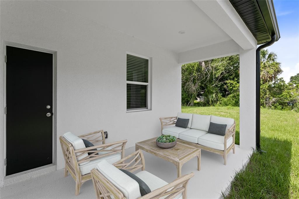 A covered lanai gives you an outdoor space to make your own and the one car garage provides parking or storage depending on your needs. Virtually Staged.