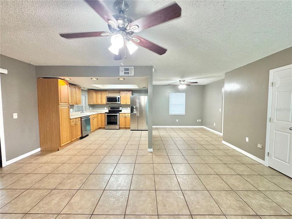 Living room looking into kitchen/dining area