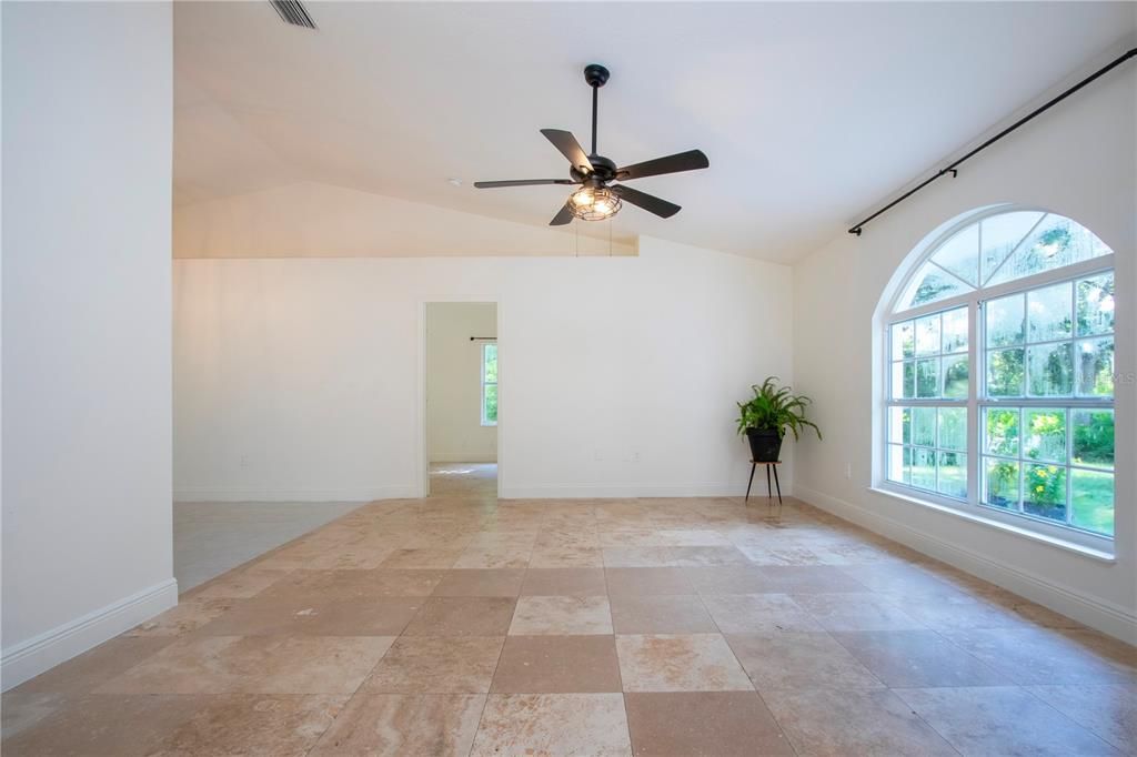 Full view of greatroom with travertine flooring