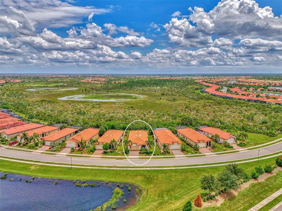 There is a small pond in front of the home and florida preserve is behind the home - there will never be anyone building there.