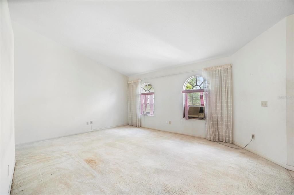 living room, property has central AC.