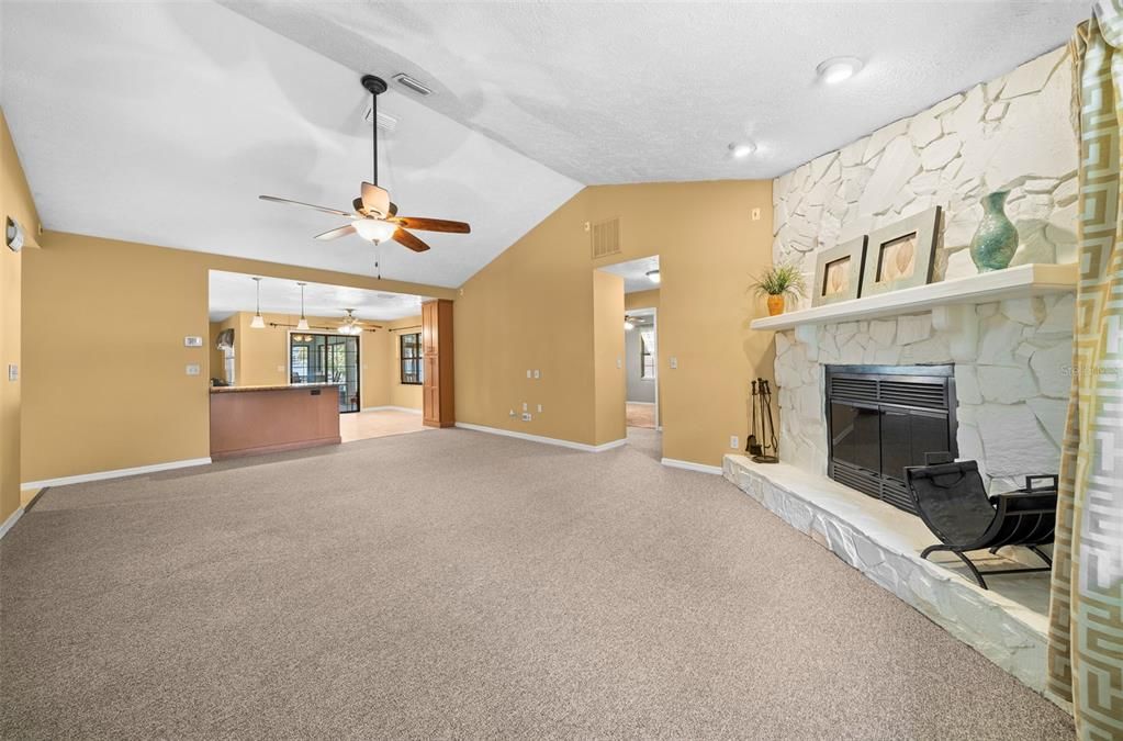 Living Room with Wood Burning Fireplace