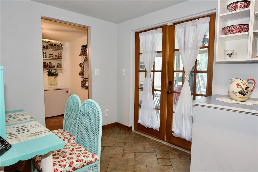 French Doors leading to the Spacious Florida Room