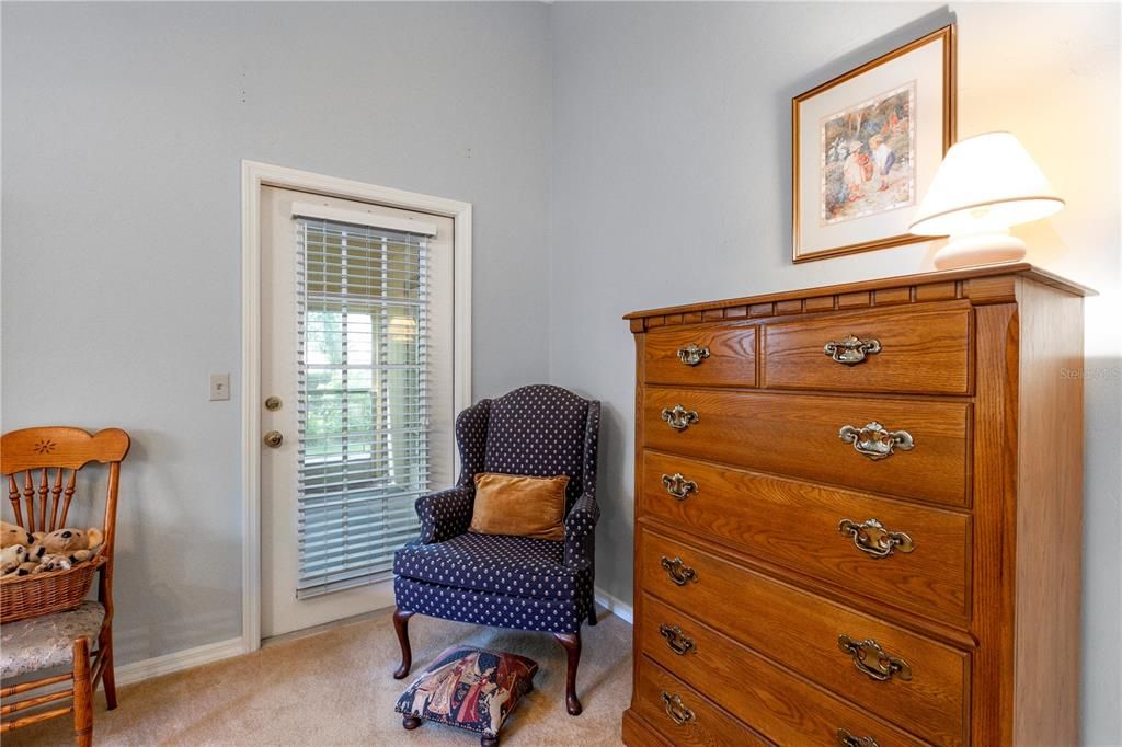 Primary Bedroom w access to screened porch