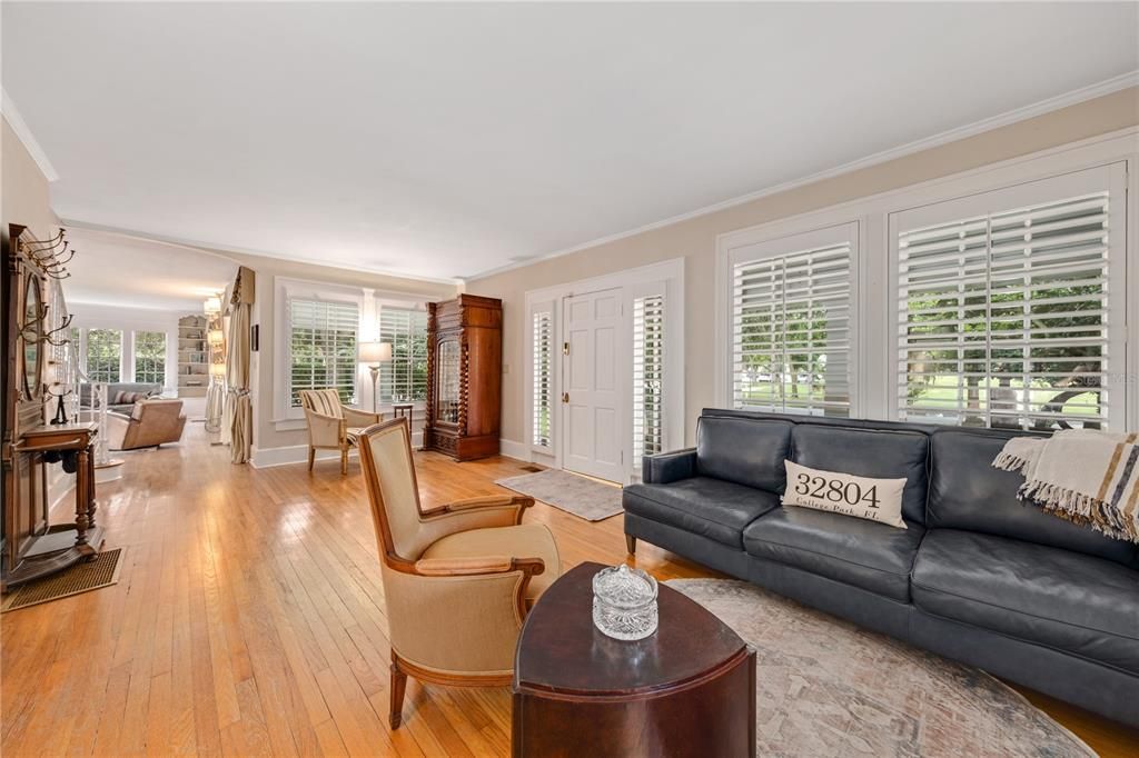 Original hardwood floors welcome you into the space