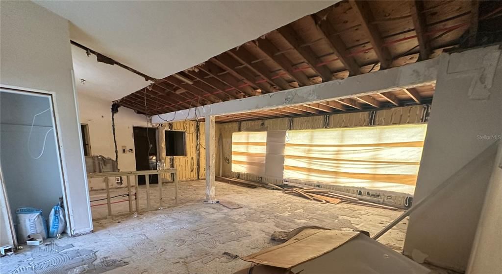 View of the Living Room, Dining and Kitchen