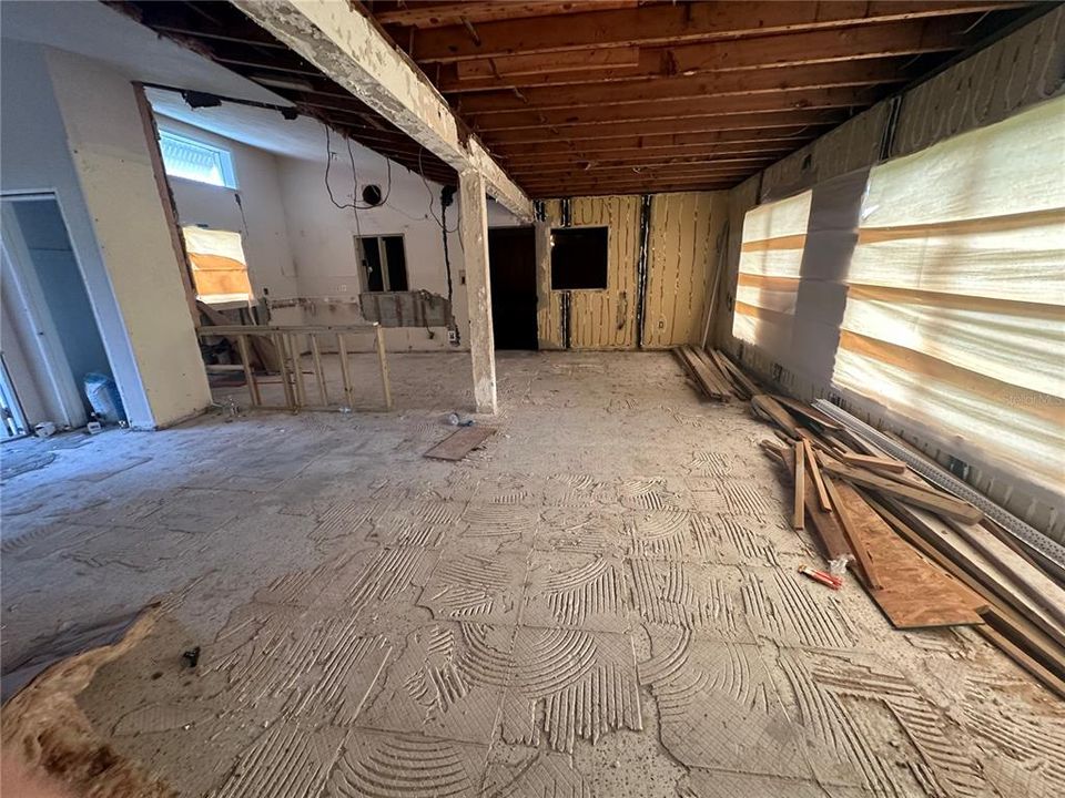 From Living Room, view of the dining and kitchen