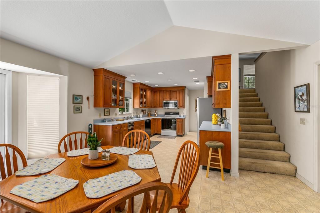 Dining area off Kitchen - Stairs to Bonus Room above garage