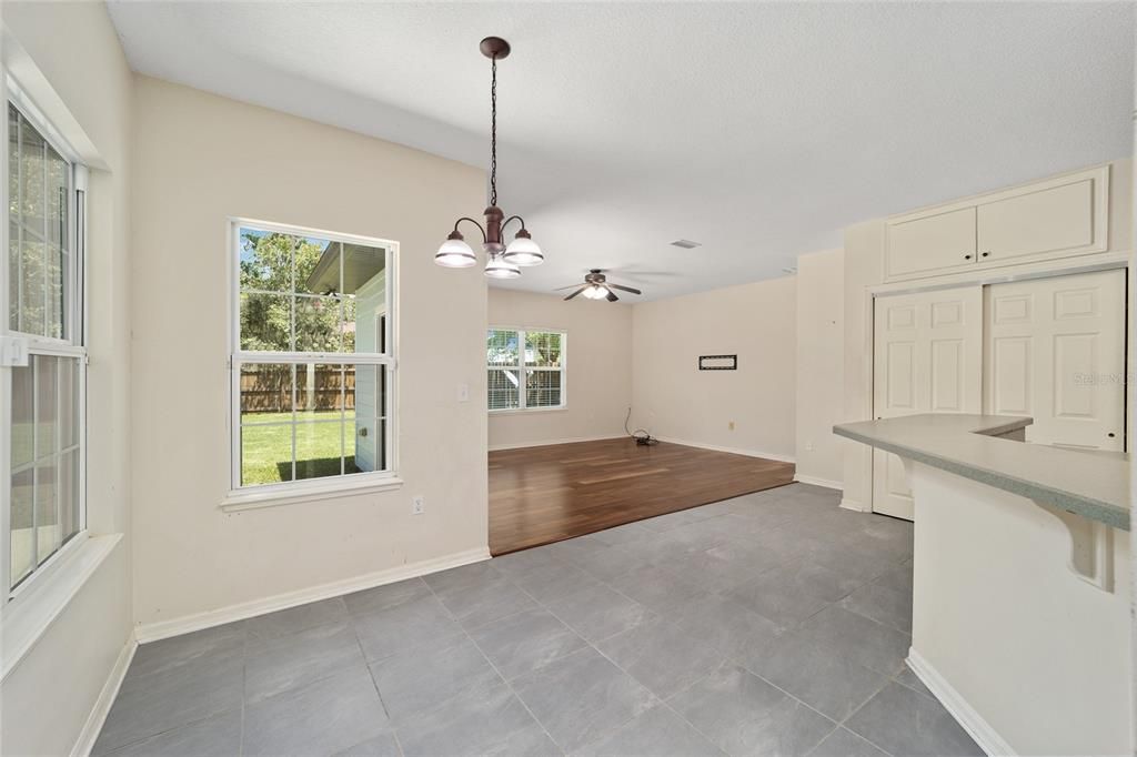 SPACIOUS BREAKFAST AREA OVERLOOKS BACK YARD