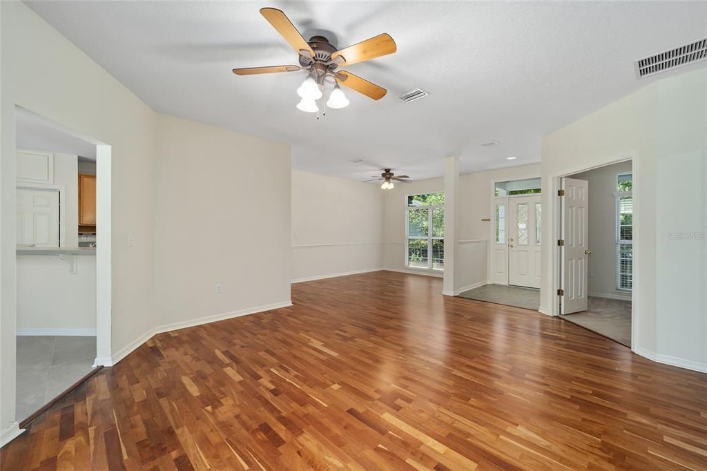 LOOKING FROM FORMAL LIVING ROOM INTO FORMAL DINING ROOM