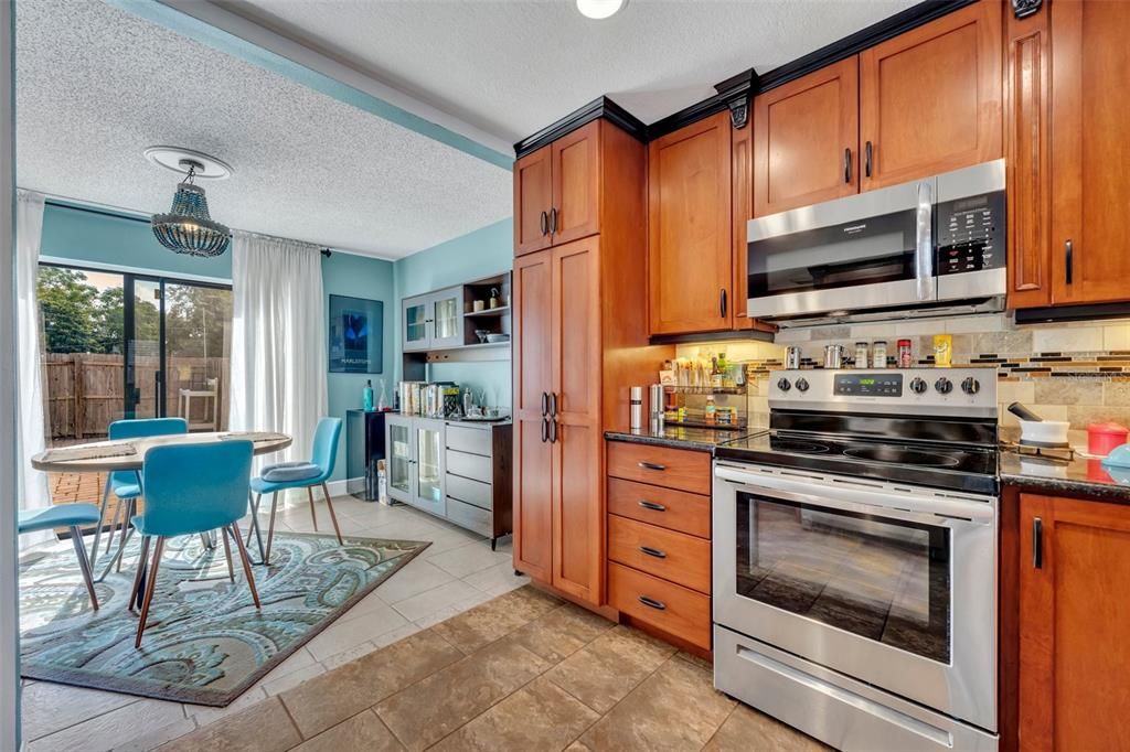 Kitchen and Dining room and Sliding glass to Patio